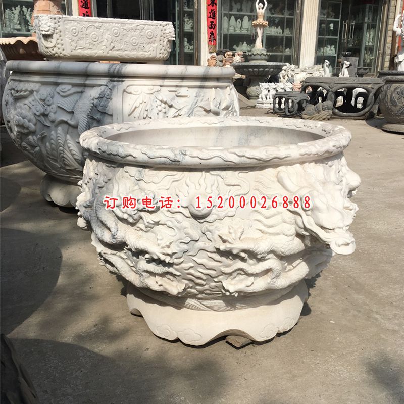 石雕水缸，龙浮雕水缸
