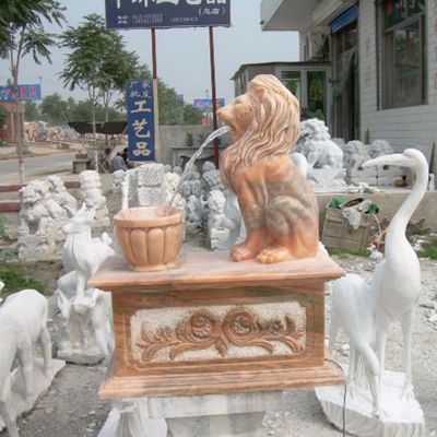 石雕狮子喷泉，晚霞红狮子喷泉雕塑