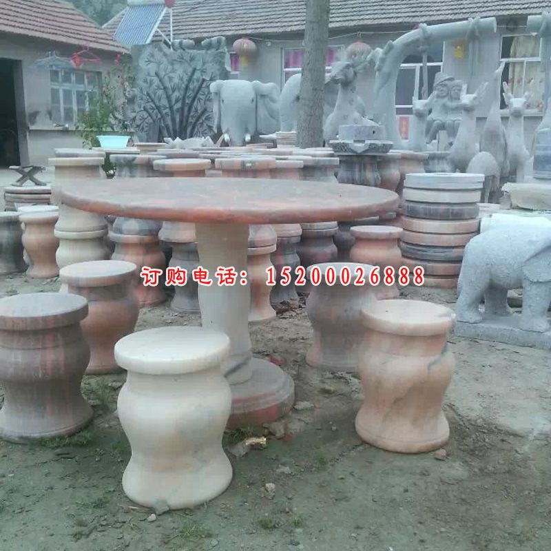 圆桌圆凳石雕，晚霞红桌凳雕塑