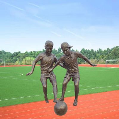 玻璃钢仿铜踢足球的儿童 公园人物雕塑