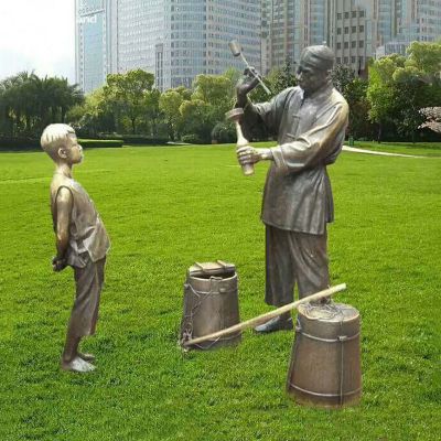 步行街打油的人物雕塑 玻璃钢仿铜人物雕塑